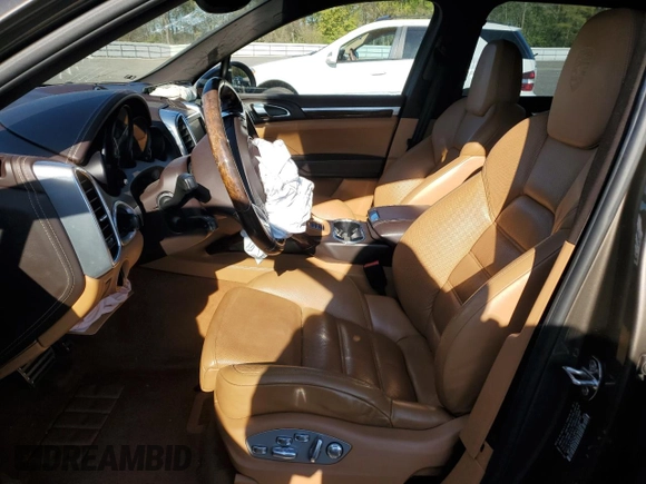 2012 Porsche Cayenne S z VIN WP1AB2A29CLA43084, wystawiony jako Copart lot #53424175 z przebiegiem Nie podano mil oraz Szkody całkowita. Historia ofert i sprzedaży dostępna na DreamBid. Obrazek 7.