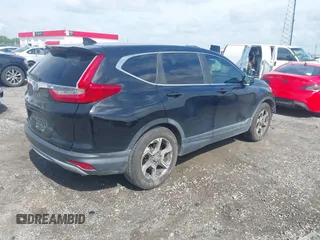 2018 Honda CR-V EX with VIN 7FARW1H59JE001943, listed as a IAAI auction lot 42123180 with 72,451 mi miles and . Bid and sale history available at carsss.com. Image 4.