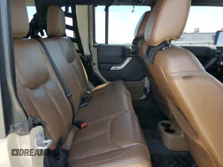 2016 Jeep Wrangler Unlimited Rubicon z VIN 1C4HJWFGXGL236560, wystawiony jako Copart lot #57528355 z przebiegiem 64 634 mil mil oraz Szkoda całkowita • Salvage title. Historia ofert i sprzedaży dostępna na DreamBid. Obrazek 11.