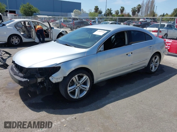 2014 Volkswagen CC R-Line with VIN WVWBP7AN0EE527649, listed as a IAAI auction lot 42009588 with 122,964 mi miles. Bid and sale history available at carsss.com. Image 18.