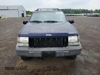 1998 Jeep Grand Cherokee Laredo with VIN 1J4GZ58SXWC144437, listed as a Copart auction lot 60437094 with 183,908 mi miles and Salvage Title. Bid and sale history available at carsss.com. Image 5.
