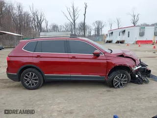 2020 Volkswagen Tiguan SE with VIN 3VV2B7AX2LM018722, listed as a IAAI auction lot 41802291 with 58,914 mi miles. Bid and sale history available at carsss.com. Image 13.