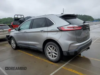 2021 Ford Edge SEL с VIN 2FMPK4J92MBA11014, выставлен на аукционе Copart как лот 61131095 с пробегом 64 316 миль миль и Списание • Salvage title. История ставок и продаж доступна на DreamBid. Изображение 2.