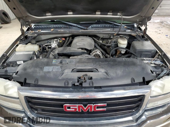 2003 GMC Sierra 1500 SLT z VIN 2GTEK19T731294136, wystawiony jako Copart lot #52197285 z przebiegiem 131 232 mil mil oraz Nie do naprawy • Non repairable. Historia ofert i sprzedaży dostępna na DreamBid. Obrazek 11.