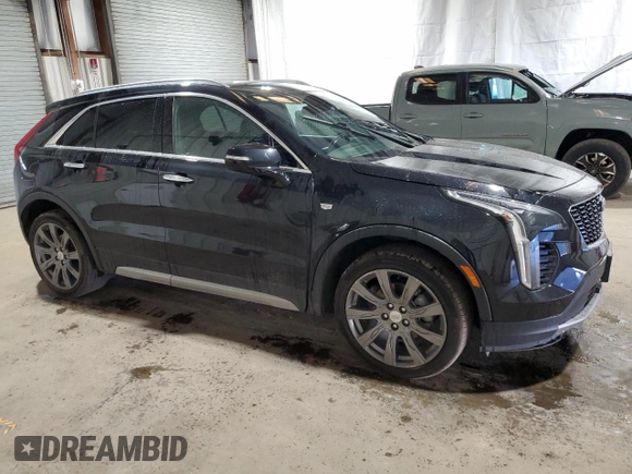 2021 Cadillac XT4 AWD Premium Luxury z VIN 1GYFZDR41MF001099, wystawiony jako Copart lot #48744655 z przebiegiem 57 633 mil mil oraz Czysty tytuł • Clean title. Historia ofert i sprzedaży dostępna na DreamBid. Obrazek 4.