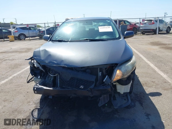 2009 Toyota Corolla with VIN 1NXBU40E69Z034459, listed as a IAAI auction lot 42095649 with 173,296 mi miles. Bid and sale history available at carsss.com. Image 12.