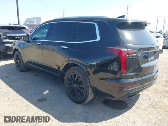 2021 Cadillac XT6 Premium Luxury z VIN 1GYKPCRS9MZ221232, wystawiony jako IAAI lot #41783431 z przebiegiem 69 367 mil mil oraz . Historia ofert i sprzedaży dostępna na DreamBid. Obrazek 3.