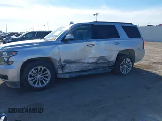2020 Chevrolet Tahoe LT with VIN 1GNSCBKC5LR226822, listed as a IAAI auction lot 41334853 with 77,091 mi miles and . Bid and sale history available at DreamBid. Image 6.