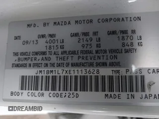 2014 Mazda Mazda3 i Touring with VIN JM1BM1L7XE1113628, listed as a IAAI auction lot 41218193 with 166,469 mi miles. Bid and sale history available at carsss.com. Image 9.