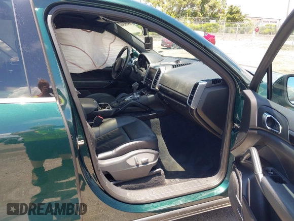 2014 Porsche Cayenne with VIN WP1AA2A21ELA06570, listed as a IAAI auction lot 42473298 with 61,421 mi miles and . Bid and sale history available at DreamBid. Image 5.