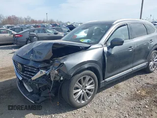 2021 Mazda CX-9 Signature with VIN JM3TCBEY5M0523199, listed as a IAAI auction lot 41916480 with 56,772 mi miles. Bid and sale history available at carsss.com. Image 17.