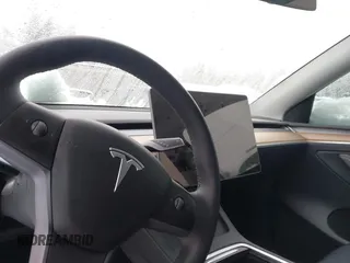 2023 Tesla Model Y Performance with VIN 7SAYGDEF4PF797192, listed as a IAAI auction lot 41550259 with 13,312 mi miles and . Bid and sale history available at DreamBid. Image 17.