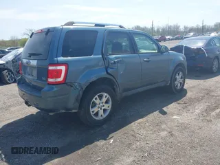 2011 Ford Escape Limited with VIN 1FMCU9EG1BKB19982, listed as a IAAI auction lot 42053239 with 247,669 mi miles. Bid and sale history available at carsss.com. Image 4.