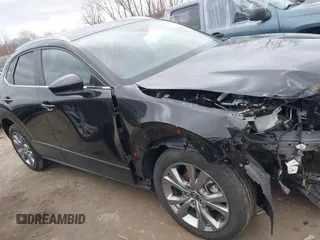 2023 Mazda CX-30 S Carbon Edition with VIN 3MVDMBCMXPM553129, listed as a IAAI auction lot 41864876 with 18,317 mi miles and . Bid and sale history available at DreamBid. Image 14.