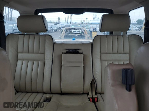 2000 Land Rover Range Rover z VIN SALPV1645YA445526, wystawiony jako Copart lot #59591285 z przebiegiem 158 729 mil mil oraz Szkoda całkowita • Salvage title. Historia ofert i sprzedaży dostępna na DreamBid. Obrazek 10.