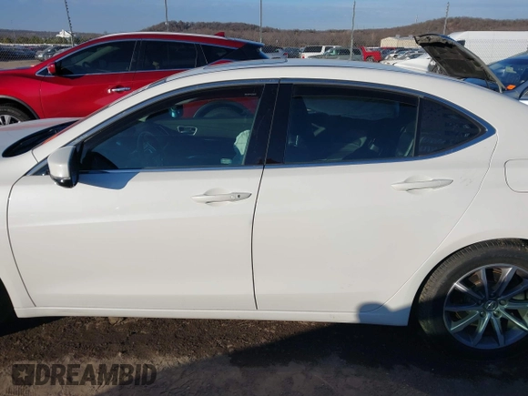 2018 Acura TLX with VIN 19UUB1F32JA000145, listed as a IAAI auction lot 41244292 with 83,254 mi miles and . Bid and sale history available at DreamBid. Image 14.