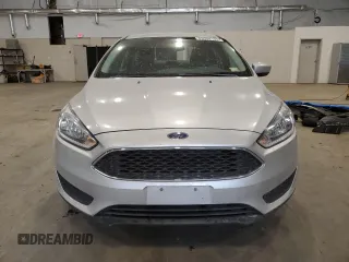 2018 Ford Focus SE z VIN 1FADP3F24JL315154, wystawiony jako Copart lot #53609185 z przebiegiem 76 216 mil mil oraz Szkoda całkowita • Salvage title. Historia ofert i sprzedaży dostępna na DreamBid. Obrazek 5.