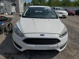 2016 Ford Focus SE с VIN 1FADP3F29GL323601, выставлен на аукционе Copart как лот 56407185 с пробегом 57 000 миль миль и Списание • Salvage title. История ставок и продаж доступна на DreamBid. Изображение 5.