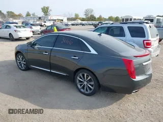 2013 Cadillac XTS Luxury with VIN 2G61P5S3XD9228218, listed as a IAAI auction lot 40503666 with 87,857 mi miles. Bid and sale history available at carsss.com. Image 3.