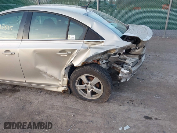 2014 Chevrolet Cruze 1LT z VIN 1G1PC5SB1E7341321, wystawiony jako IAAI lot #42527362 z przebiegiem 171 570 mil mil oraz . Historia ofert i sprzedaży dostępna na DreamBid. Obrazek 6.