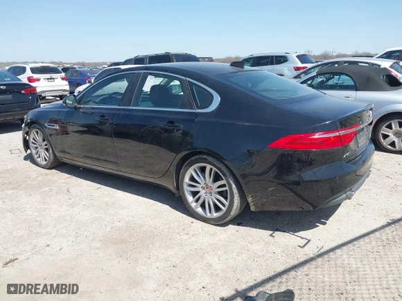 2016 Jaguar XF 35t Prestige with VIN SAJBE4BV8GCY02560, listed as a IAAI auction lot 41704209 with 109,917 mi miles. Bid and sale history available at carsss.com. Image 3.