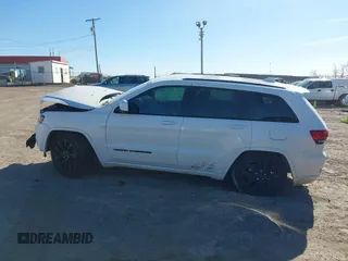 2017 Jeep Grand Cherokee Laredo with VIN 1C4RJEAG4HC952779, listed as a IAAI auction lot 41692543 with 138,062 mi miles and . Bid and sale history available at DreamBid. Image 13.