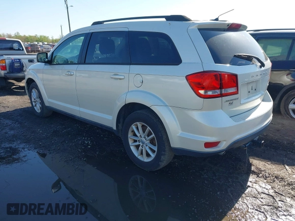 2013 Dodge Journey SXT with VIN 3C4PDCBG1DT563727, listed as a IAAI auction lot 42003852 with 202,516 mi miles and . Bid and sale history available at DreamBid. Image 3.