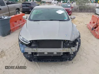 2015 Ford Fusion SE with VIN 3FA6P0H70FR211303, listed as a IAAI auction lot 41879349 with 104,896 mi miles. Bid and sale history available at carsss.com. Image 13.