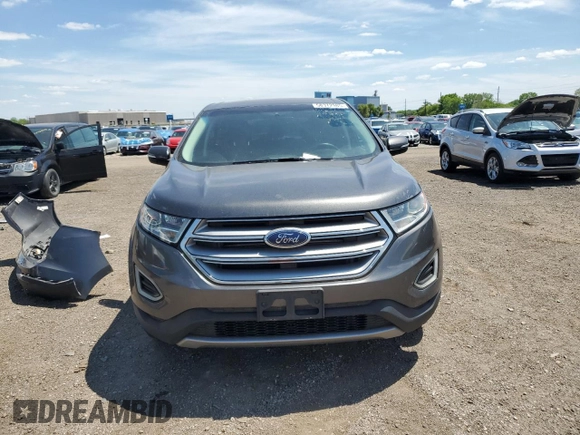 2016 Ford Edge SEL z VIN 2FMPK4J80GBC17489, wystawiony jako Copart lot #58372985 z przebiegiem 131 423 mil mil oraz Szkoda całkowita • Salvage title. Historia ofert i sprzedaży dostępna na DreamBid. Obrazek 5.