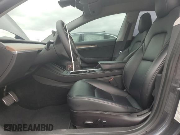 2022 Tesla Model 3 Long Range with VIN 5YJ3E1EB9NF117339, listed as a Copart auction lot 55659415 with 87,479 mi miles and Salvage Title. Bid and sale history available at DreamBid. Image 7.