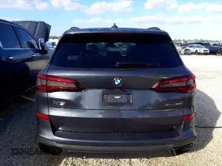 2022 BMW X5 sDrive40i with VIN 5UXCR4C08N9M98312, listed as a Copart auction lot 69814452 with 2,495 mi miles. Bid and sale history available at carsss.com. Image 6.