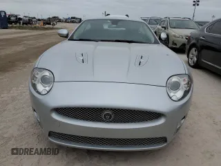 2007 Jaguar XK with VIN SAJWA43C979B19440, listed as a Copart auction lot 76762184 with 0 mi miles and Salvage Title. Bid and sale history available at carsss.com. Image 5.