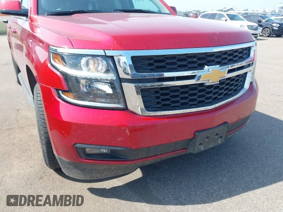 2015 Chevrolet Suburban LT with VIN 1GNSKJKC5FR726299, listed as a IAAI auction lot 42740904 with 96,700 mi miles and . Bid and sale history available at DreamBid. Image 6.
