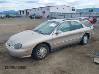 1998 Ford Taurus with VIN 1FAFP57U8WG275844, listed as a IAAI auction lot 42426107 with 318,654 mi miles and . Bid and sale history available at DreamBid. Image 2.