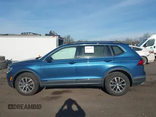 2020 Volkswagen Tiguan SE with VIN 3VV2B7AX2LM017277, listed as a IAAI auction lot 42075052 with 72,248 mi miles and . Bid and sale history available at DreamBid. Image 14.