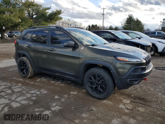 2015 Jeep Cherokee Trailhawk z VIN 1C4PJMBS5FW593975, wystawiony jako Copart lot #43347765 z przebiegiem Nie podano mil oraz Czysty tytuł • Clean title. Historia ofert i sprzedaży dostępna na DreamBid. Obrazek 4.