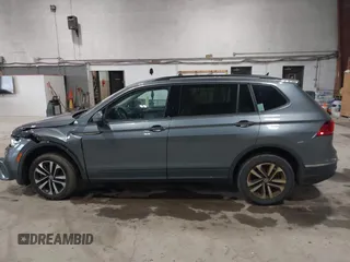 2022 Volkswagen Tiguan S z VIN 3VV0B7AX2NM042934, wystawiony jako IAAI lot #42172199 z przebiegiem 71 367 mil mil oraz . Historia ofert i sprzedaży dostępna na DreamBid. Obrazek 14.