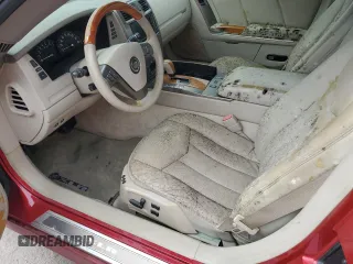 2005 Cadillac XLR z VIN 1G6YV34A855601016, wystawiony jako Copart lot #74436784 z przebiegiem Nie podano mil oraz Szkody całkowita. Historia ofert i sprzedaży dostępna na DreamBid. Obrazek 7.