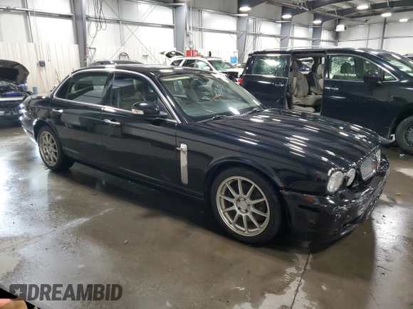 2008 Jaguar XJ Vanden Plas with VIN SAJWA82B28SH19503, listed as a Copart auction lot 78394894 with 159,071 mi miles and Salvage Title. Bid and sale history available at carsss.com. Image 4.