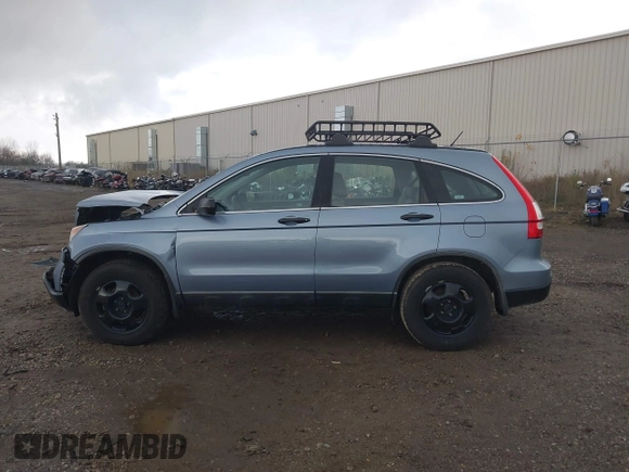 2009 Honda CR-V LX with VIN 5J6RE48339L016522, listed as a IAAI auction lot 40783609 with 209,891 mi miles. Bid and sale history available at carsss.com. Image 14.