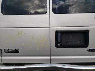 2002 Ford Econoline Passenger XL with VIN 1FBSS31L12HA34583, listed as a Copart auction lot 86967804 with 205,413 mi miles and Salvage title. Bid and sale history available at DreamBid. Image 10.