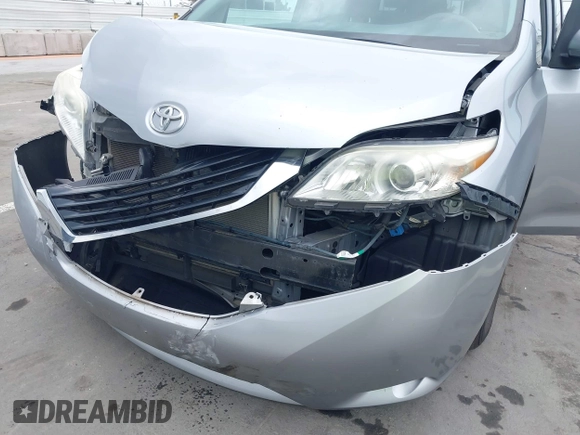 2012 Toyota Sienna LE AAS with VIN 5TDKK3DC8CS232582, listed as a IAAI auction lot 42068684 with 89,556 mi miles and . Bid and sale history available at DreamBid. Image 6.