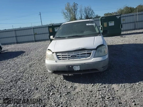 2007 Ford Freestar Cargo z VIN 2FTZA546X7BA14996, wystawiony jako Copart lot #76115294 z przebiegiem 107 450 mil mil oraz Szkody całkowita. Historia ofert i sprzedaży dostępna na DreamBid. Obrazek 12.