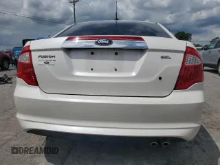 2012 Ford Fusion SEL z VIN 3FAHP0JAXCR241497, wystawiony jako Copart lot #58884165 z przebiegiem 100 813 mil mil oraz Szkoda całkowita • Salvage title. Historia ofert i sprzedaży dostępna na DreamBid. Obrazek 6.