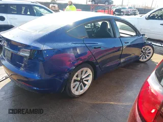 2021 Tesla Model 3 Long Range with VIN 5YJ3E1EB6MF990089, listed as a IAAI auction lot 41607316 with 25,223 mi miles and . Bid and sale history available at DreamBid. Image 14.