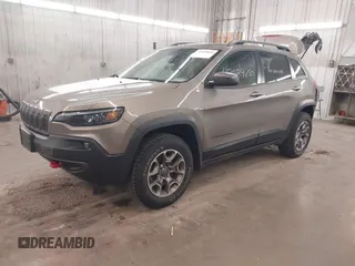 2021 Jeep Cherokee Trailhawk z VIN 1C4PJMBX5MD231018, wystawiony jako IAAI lot #42029850 z przebiegiem 66 525 mil mil oraz . Historia ofert i sprzedaży dostępna na DreamBid. Obrazek 18.