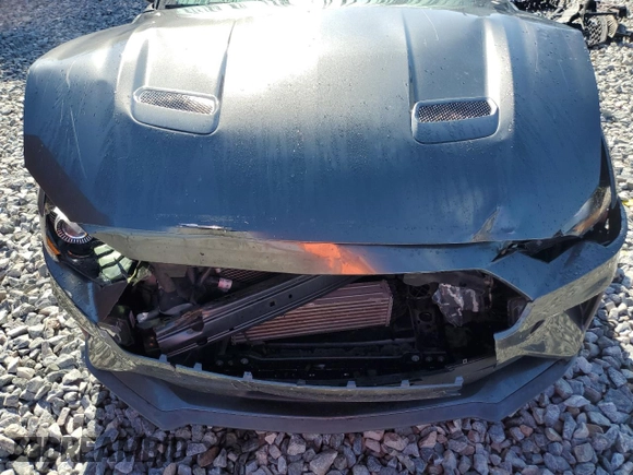 2019 Ford Mustang EcoBoost с VIN 1FA6P8TH5K5163468, выставлен на аукционе Copart как лот 56547035 с пробегом 56 977 миль миль и Списание • Salvage title. История ставок и продаж доступна на DreamBid. Изображение 11.