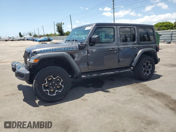 2023 Jeep Wrangler Rubicon z VIN 1C4JJXR65PW557849, wystawiony jako Copart lot #57845705 z przebiegiem 21 849 mil mil oraz Szkoda całkowita • Salvage title. Historia ofert i sprzedaży dostępna na DreamBid. Obrazek 1.