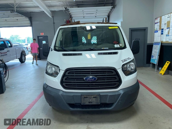 2016 Ford Transit Cargo with VIN 1FTYE1YM8GKB48865, listed as a IAAI auction lot 42843472 with 184,635 mi miles and . Bid and sale history available at DreamBid. Image 16.