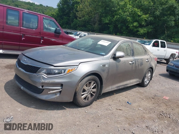 2016 Kia Optima LX z VIN 5XXGT4L34GG097375, wystawiony jako IAAI lot #42401993 z przebiegiem 145 389 mil mil oraz . Historia ofert i sprzedaży dostępna na DreamBid. Obrazek 2.